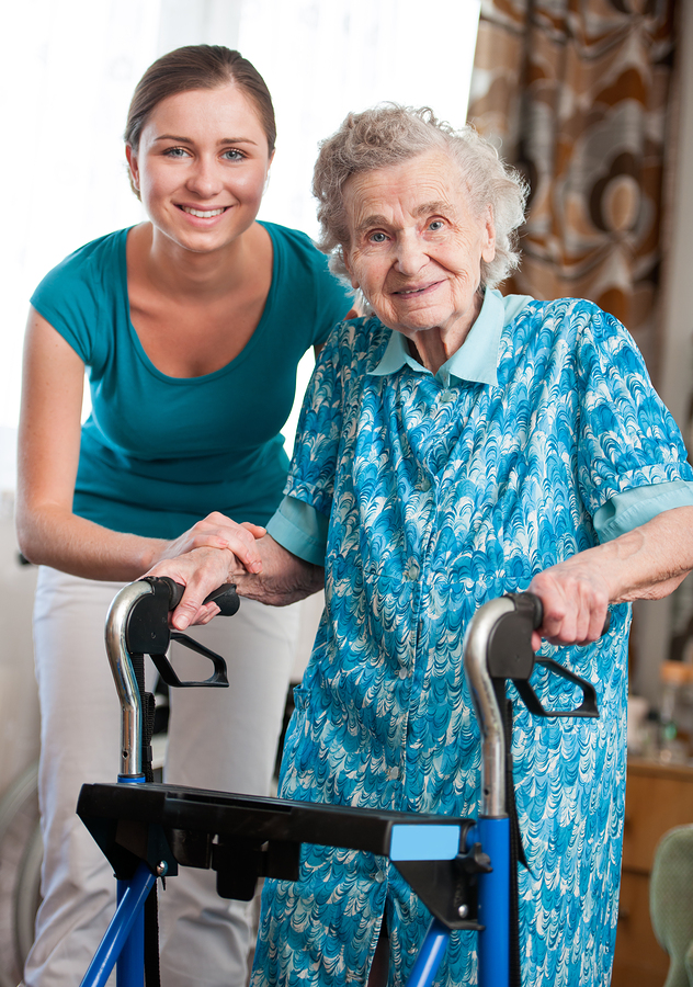 People Moving and Handling delegate assisting elderly patient