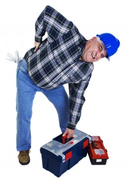 Workman with backache lifting